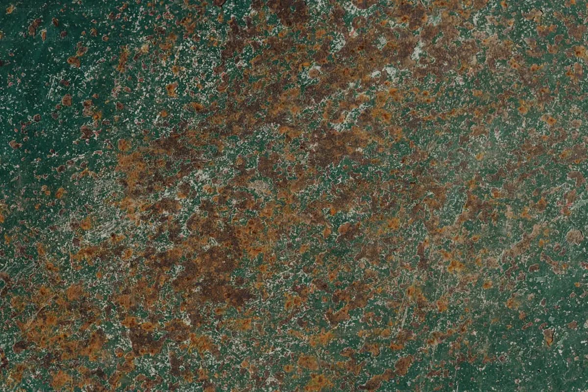 Corroded, tarnished non-ferrous metal surface before cleaning