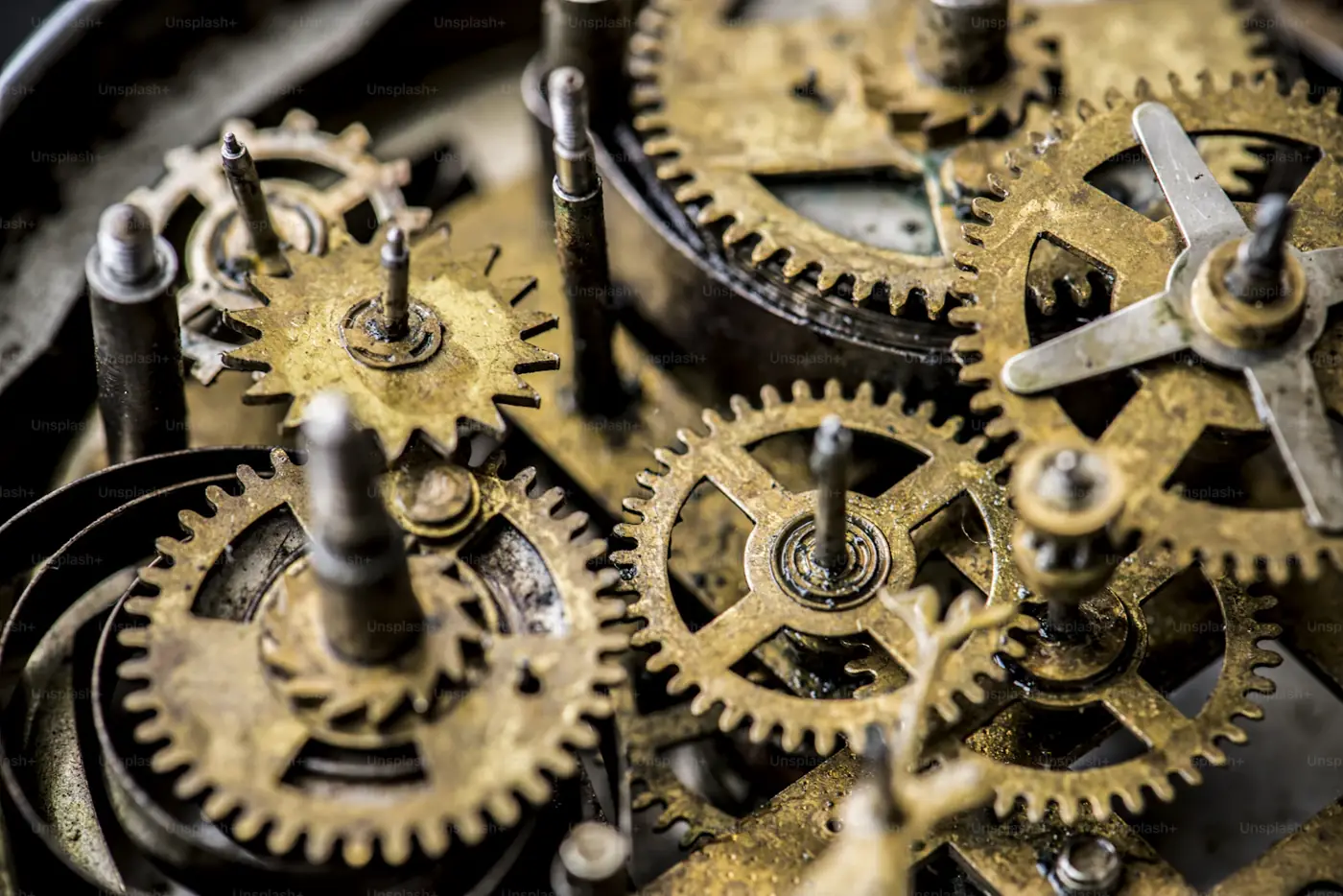 Oily machined gears and cogs before industrial degreasing