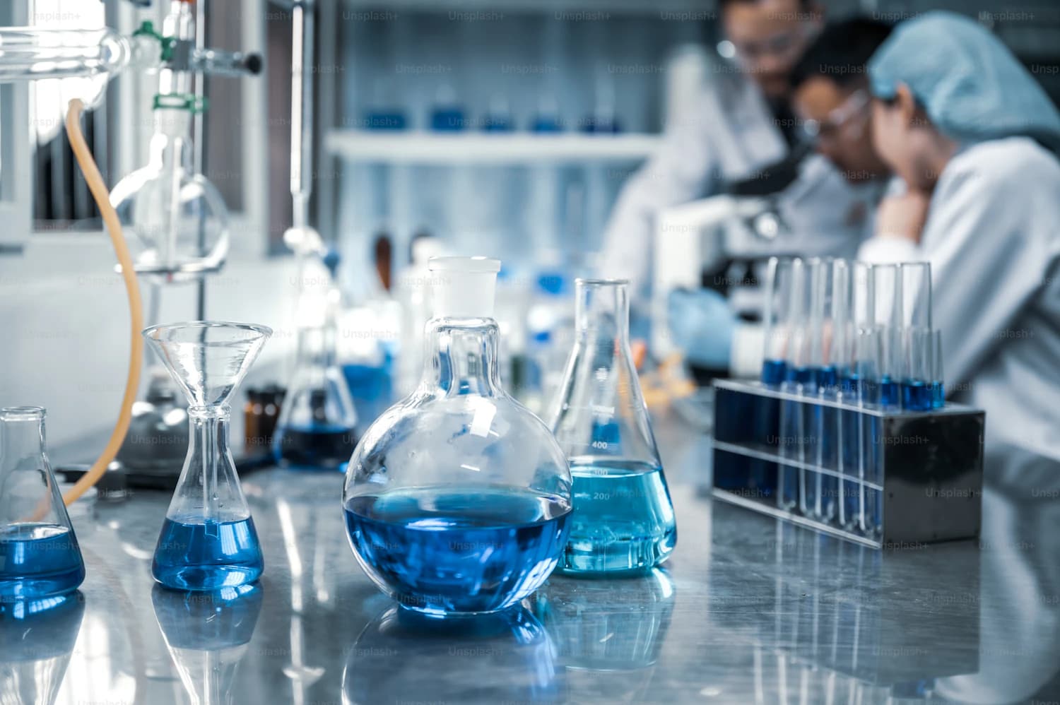 Chemists developing industrial degreaser formulations in the Power Clean laboratory